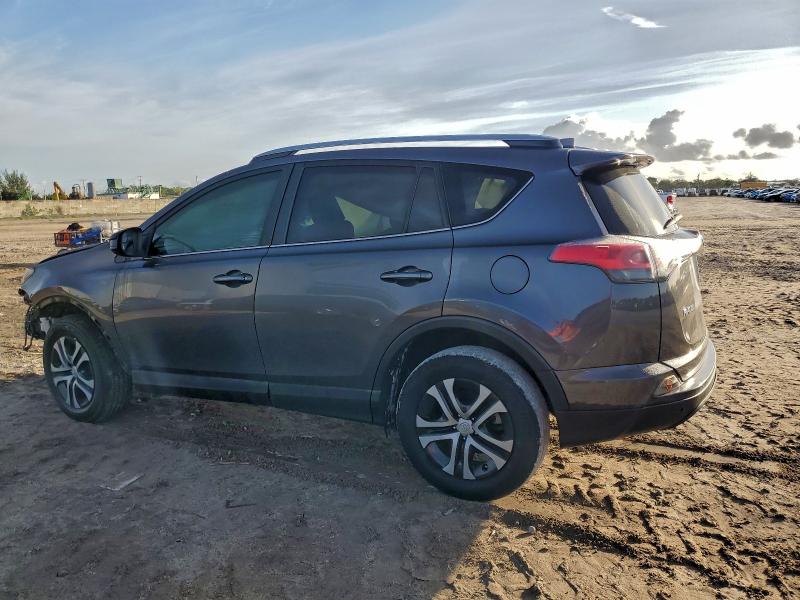 Photo 2 from auction – 2018 TOYOTA RAV4 LE with VIN JTMZFREV7JJ160984