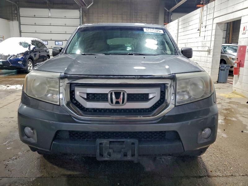Photo 5 from auction – 2011 HONDA PILOT EXL with VIN 5FNYF4H51BB095942