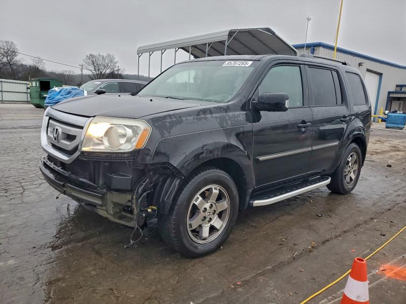 Фото 1 с аукциона – 2011 HONDA PILOT TOUR с VIN 5FNYF3H91BB010160