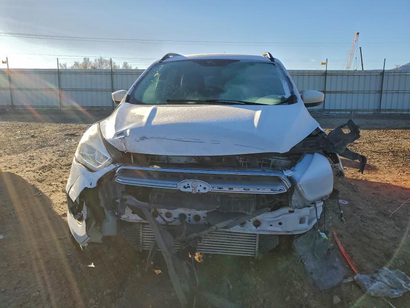 Photo 5 from auction – 2017 FORD ESCAPE SE with VIN 1FMCU9G90HUE36177