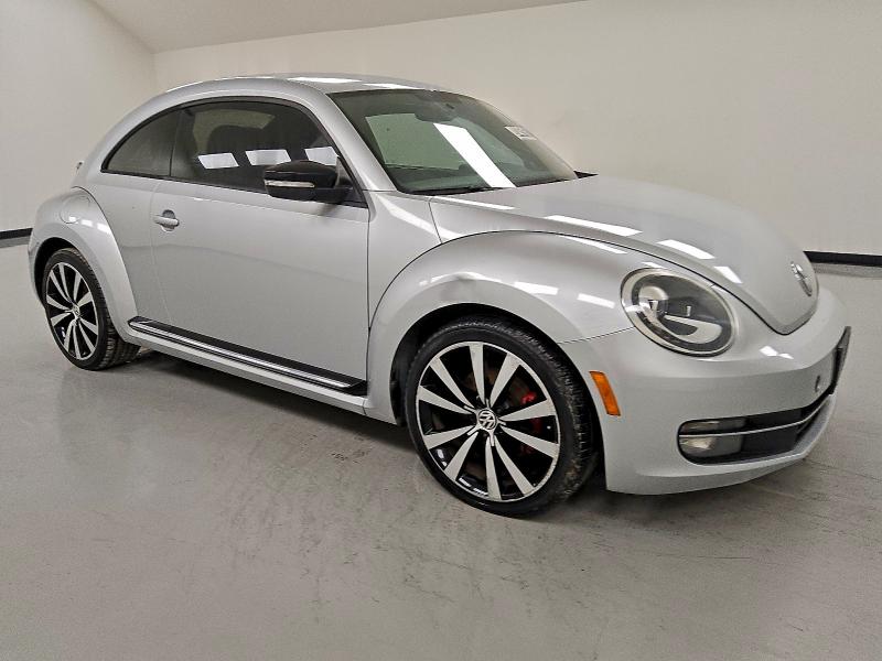 Photo 4 from auction – 2012 VOLKSWAGEN BEETLE TUR with VIN 3VWVA7ATXCM653776