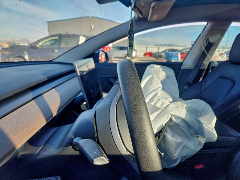 Photo 9 from auction – 2021 TESLA MODEL 3 with VIN 5YJ3E1EBXMF836727