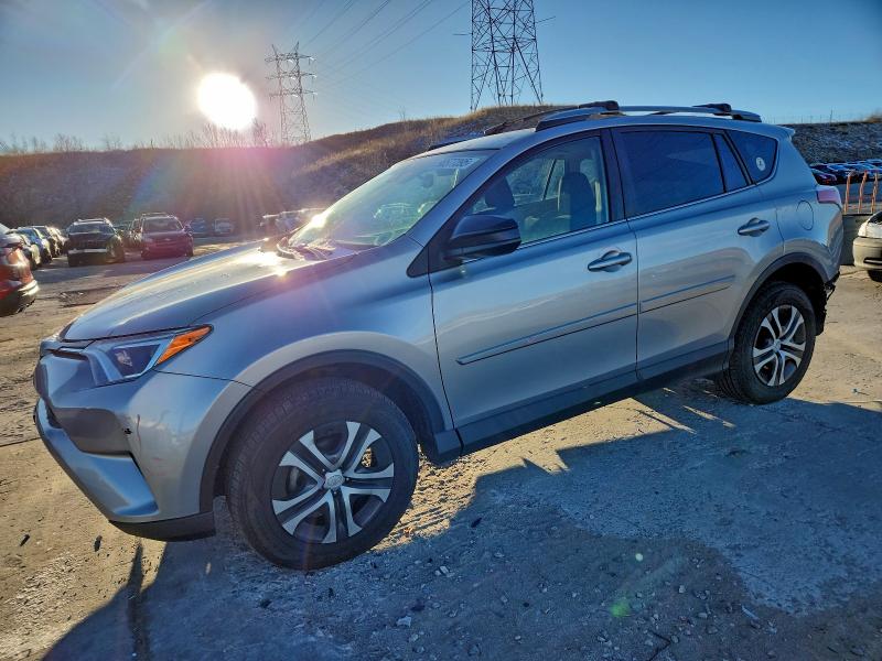 TOYOTA RAV4 LE 2017 with VIN 2T3BFREV7HW665551 - Photo from auction
