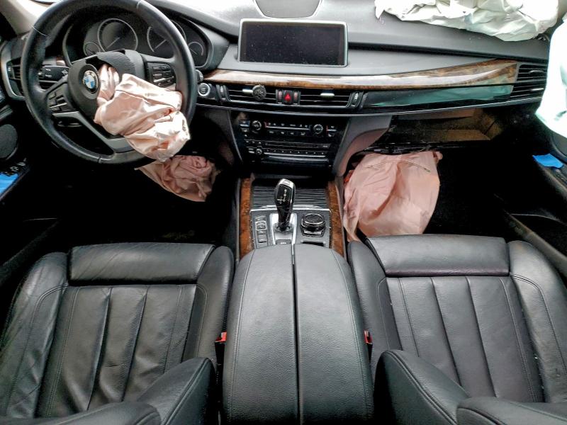 Photo 8 from auction – 2015 BMW X5 XDRIVE5 with VIN 5UXKR6C51F0J77849