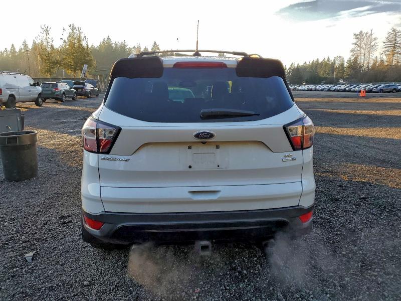 Photo 6 from auction – 2018 FORD ESCAPE SE with VIN 1FMCU9GD0JUB43406