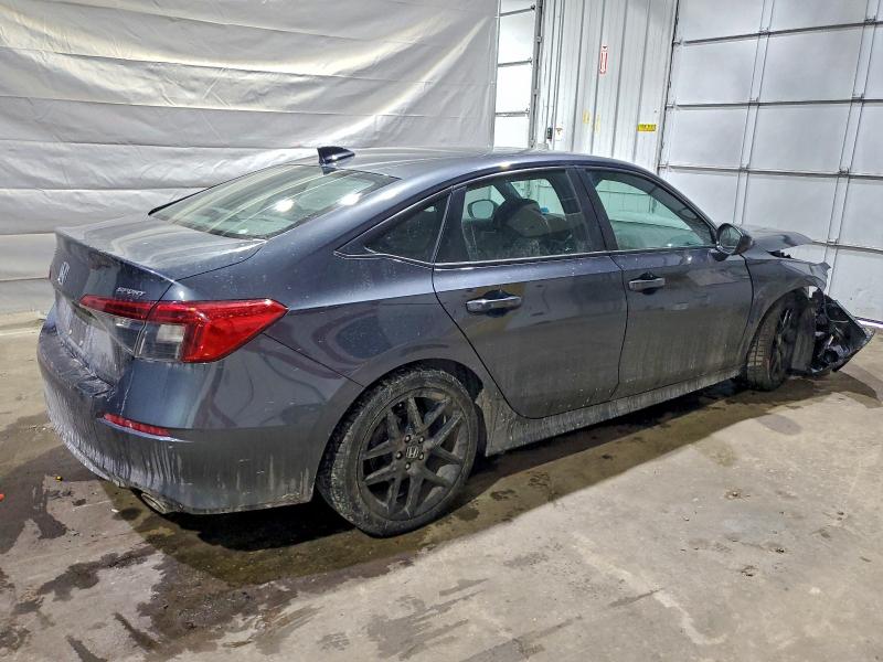 Photo 3 from auction – 2022 HONDA CIVIC SPOR with VIN 2HGFE2F58NH606970