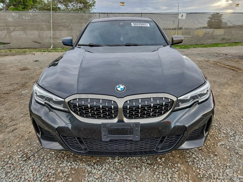 Photo 5 from auction – 2021 BMW M340I with VIN 3MW5U7J02M8B56504