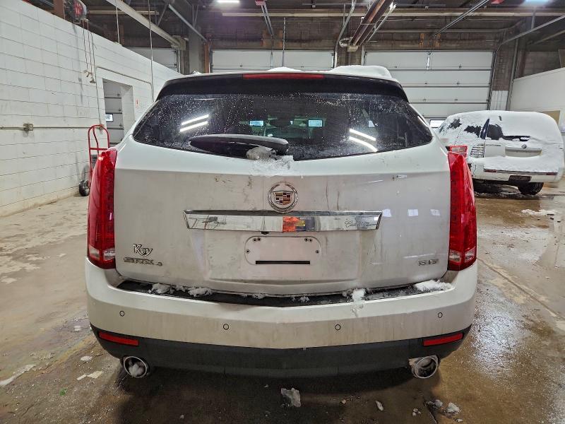 Photo 6 from auction – 2014 CADILLAC SRX LUXURY with VIN 3GYFNEE34ES647443