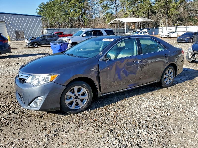TOYOTA CAMRY HYBR 2014 with VIN 4T1BD1FK4EU111884 - Photo from auction