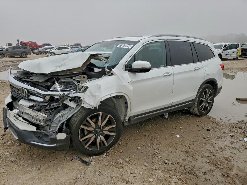 Photo 1 from auction – 2020 HONDA PILOT TOUR with VIN 5FNYF5H60LB009598