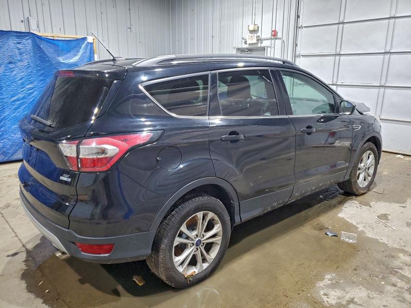 Photo 3 from auction – 2017 FORD ESCAPE SE with VIN 1FMCU9GD9HUC36693