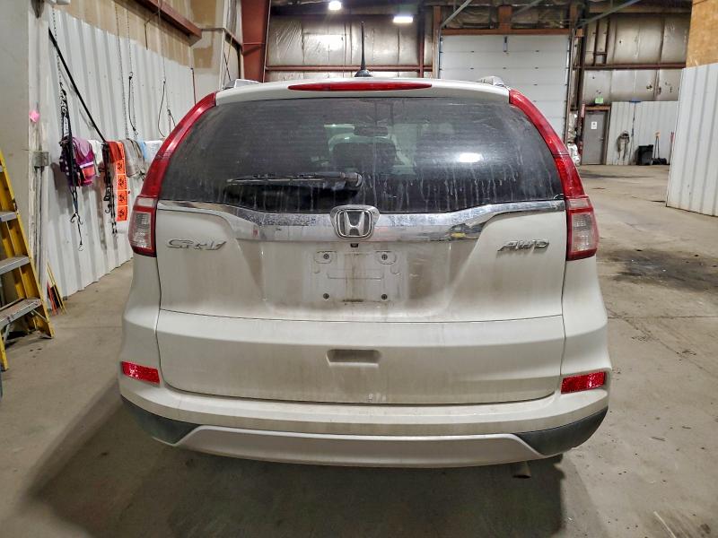 Photo 6 from auction – 2016 HONDA CR-V with VIN 5J6RM4H74GL028374