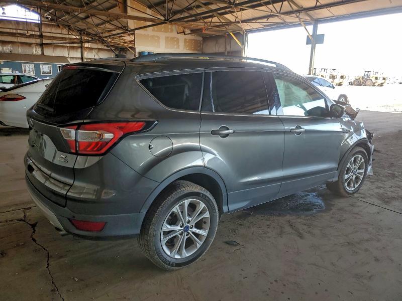 Photo 3 from auction – 2017 FORD ESCAPE SE with VIN 1FMCU9GD7HUD27378