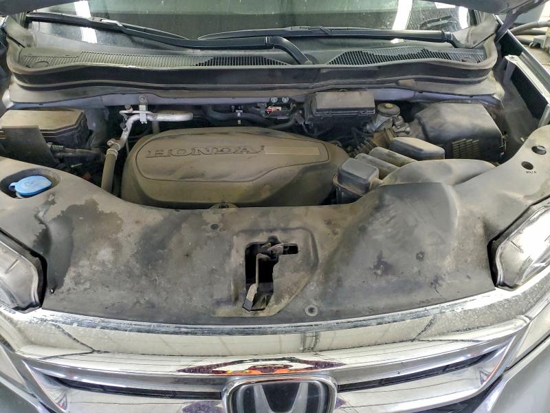 Photo 12 from auction – 2021 HONDA PILOT ELIT with VIN 5FNYF6H0XMB009675