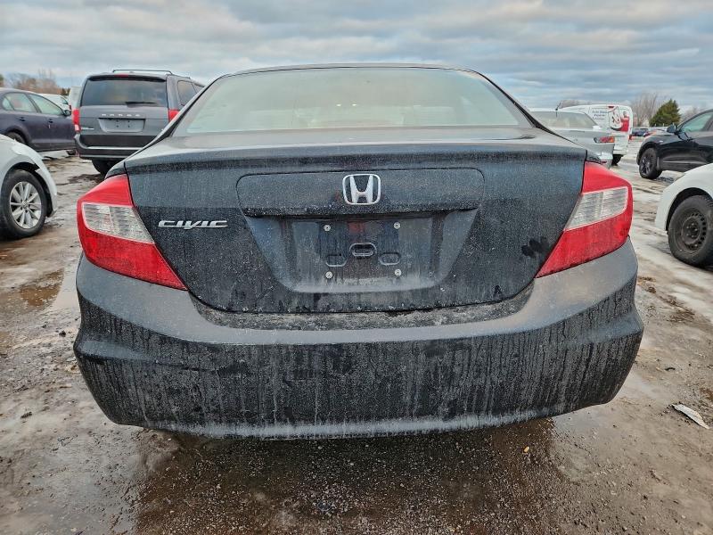 Photo 6 from auction – 2012 HONDA CIVIC LX with VIN 2HGFB2F50CH102936