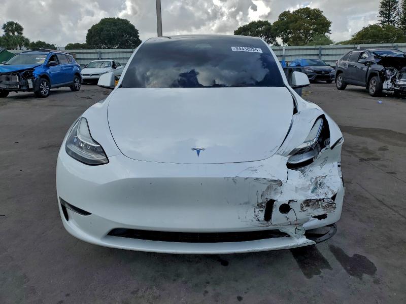 Photo 5 from auction – 2023 TESLA MODEL Y with VIN 7SAYGAEE1PF610996