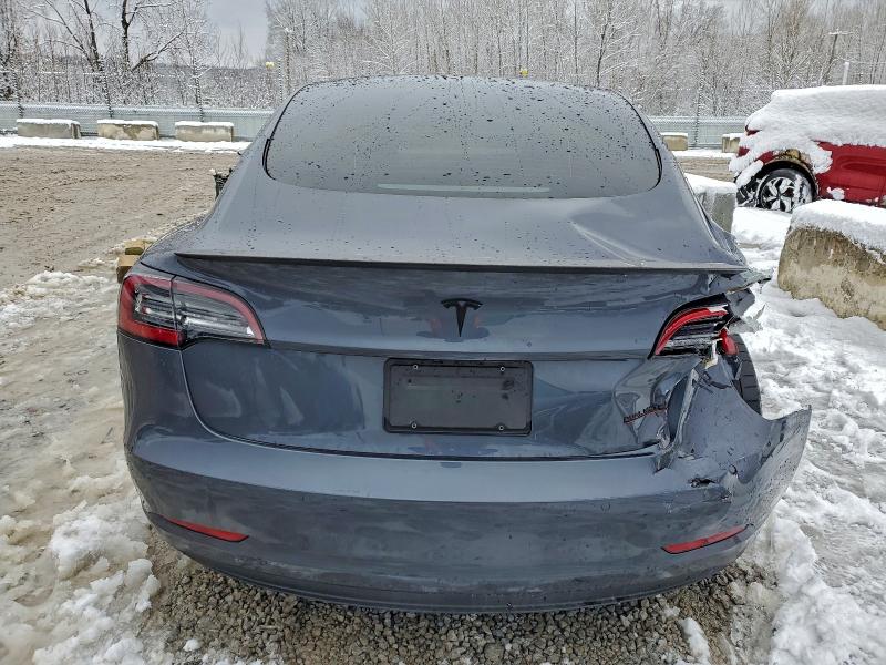 Photo 6 from auction – 2022 TESLA MODEL 3 with VIN 5YJ3E1EC8NF259853