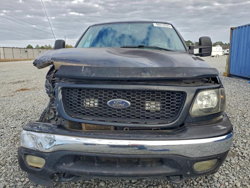 Photo 5 from auction – 2003 FORD F150 with VIN 1FTRX18L83NA17126