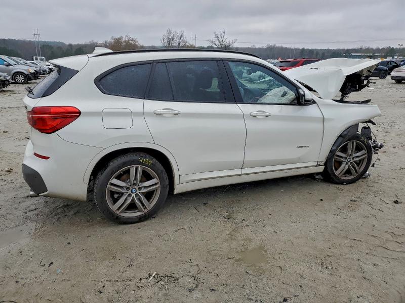 Photo 3 from auction – 2017 BMW X1 with VIN WBXHT3C38H5F69720