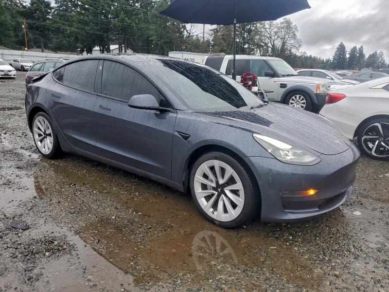 Photo 4 from auction – 2022 TESLA MODEL 3 with VIN 5YJ3E1EA7NF353527