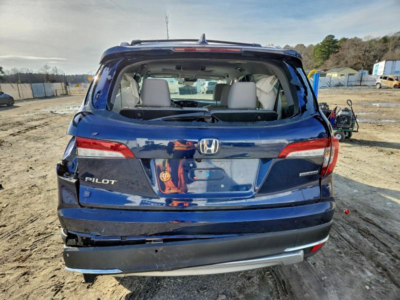 Photo 6 from auction – 2022 HONDA PILOT TOUR with VIN 5FNYF5H67NB017538