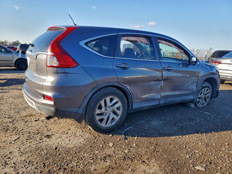 Photo 3 from auction – 2015 HONDA CR-V EX with VIN 2HKRM3H55FH545555
