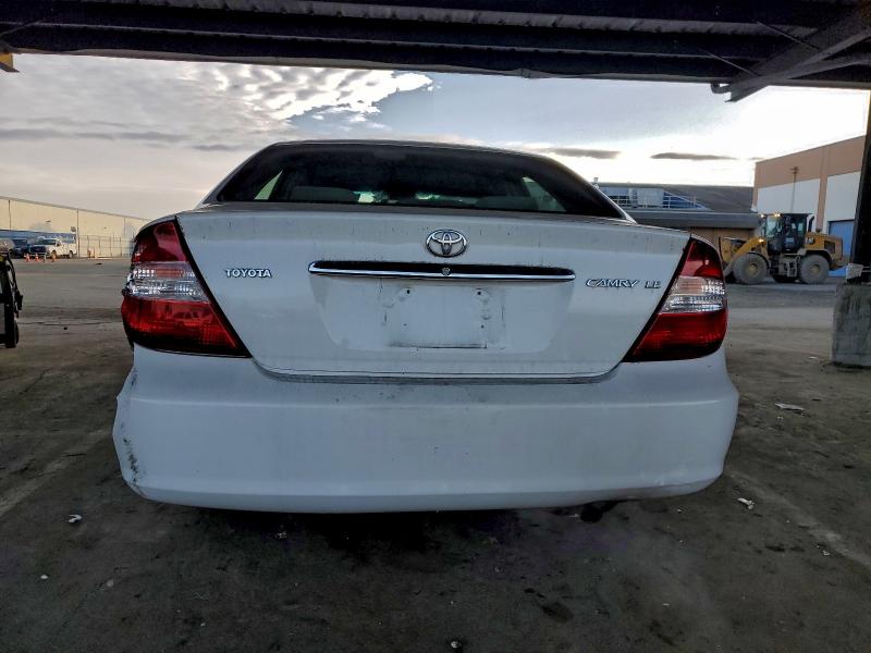 Photo 6 from auction – 2002 TOYOTA CAMRY LE with VIN JTDBE32K420068735