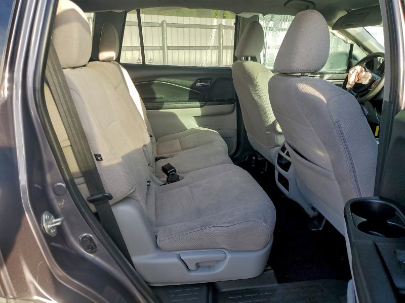 Photo 11 from auction – 2021 HONDA PILOT LX with VIN 5FNYF5H1XMB006827