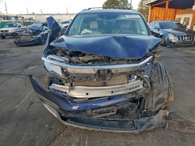 Photo 5 from auction – 2019 HONDA PILOT ELIT with VIN 5FNYF6H07KB008352