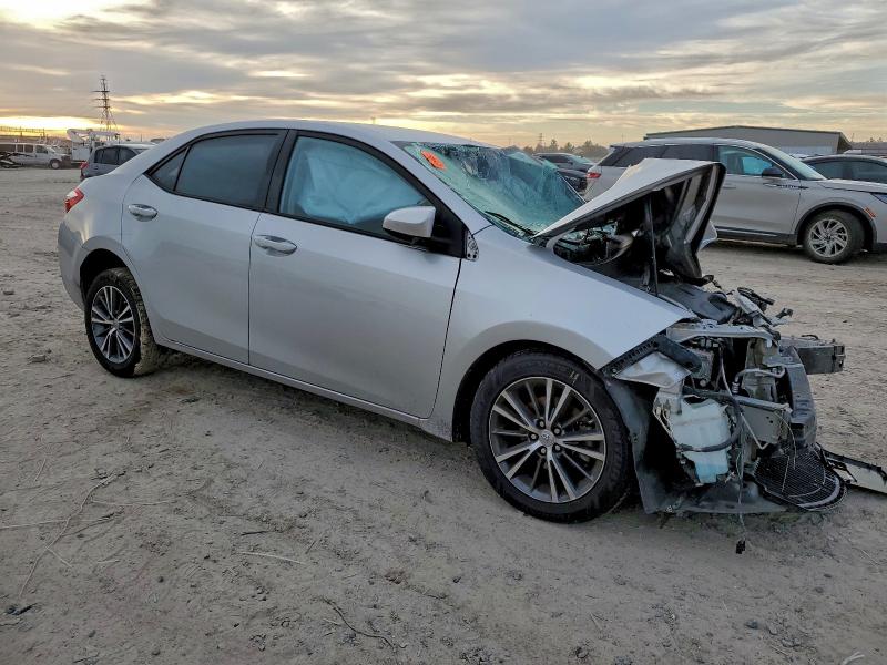 Photo 4 from auction – 2016 TOYOTA COROLLA L with VIN 5YFBURHE8GP452411