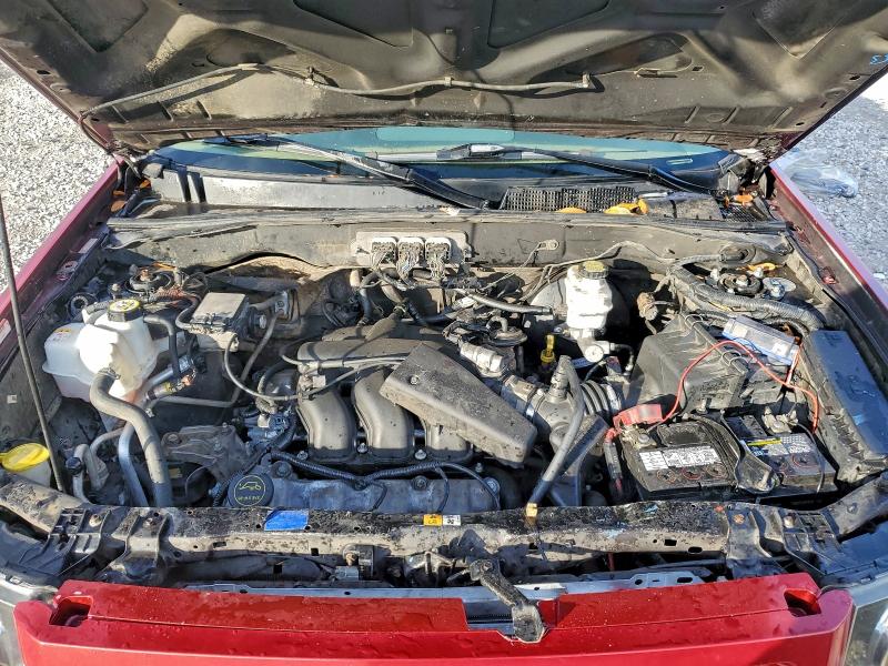 Photo 12 from auction – 2008 FORD ESCAPE LIM with VIN 1FMCU04128KB12380