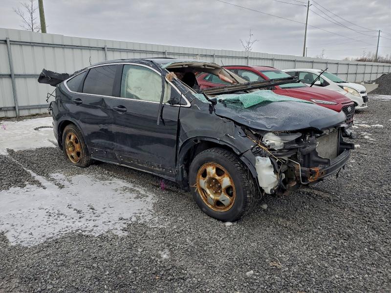 Photo 4 from auction – 2014 HONDA CR-V EX with VIN 2HKRM3H55EH004312