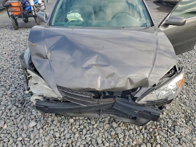 Photo 11 from auction – 2003 TOYOTA CAMRY LE with VIN 4T1BE32K63U706070