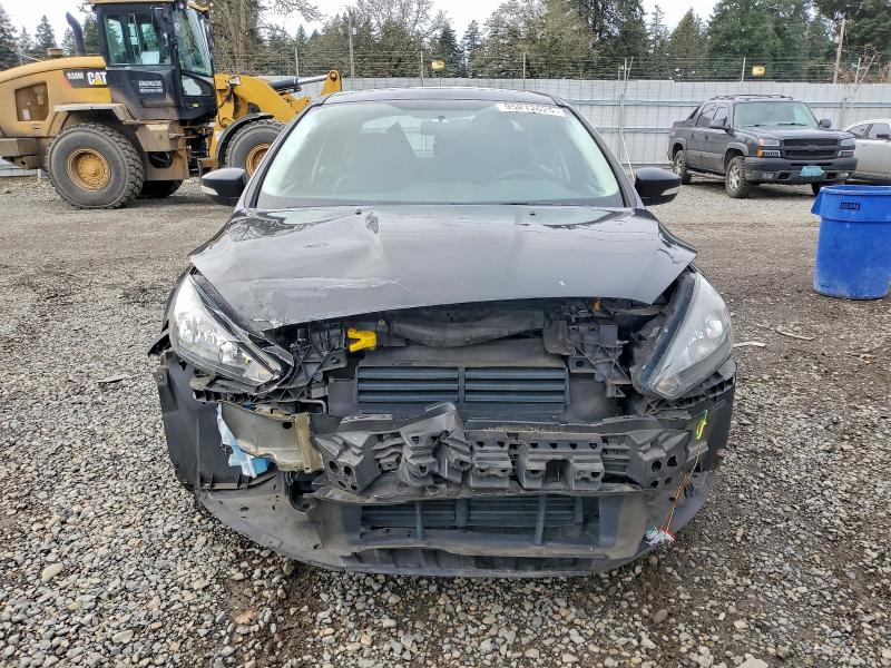 Photo 5 from auction – 2016 FORD FOCUS SE with VIN 1FADP3F2XGL374606