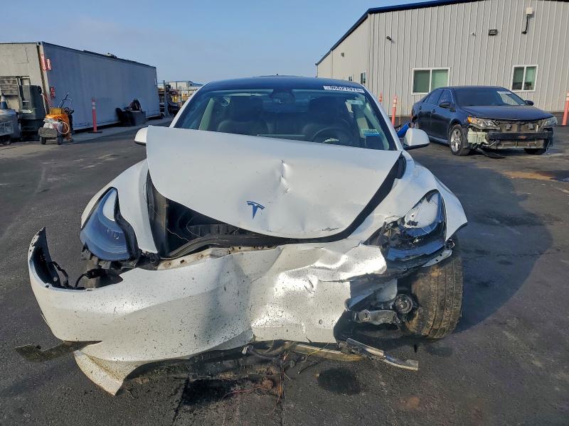 Photo 5 from auction – 2021 TESLA MODEL 3 with VIN 5YJ3E1EA9MF940343