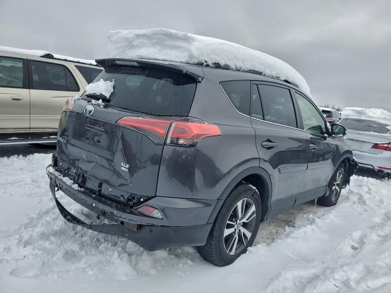 Photo 3 from auction – 2016 TOYOTA RAV4 XLE with VIN JTMRFREV1GJ060579