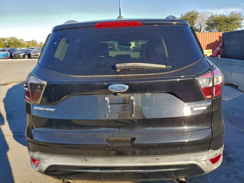 Photo 6 from auction – 2017 FORD ESCAPE TIT with VIN 1FMCU0JD7HUB49363