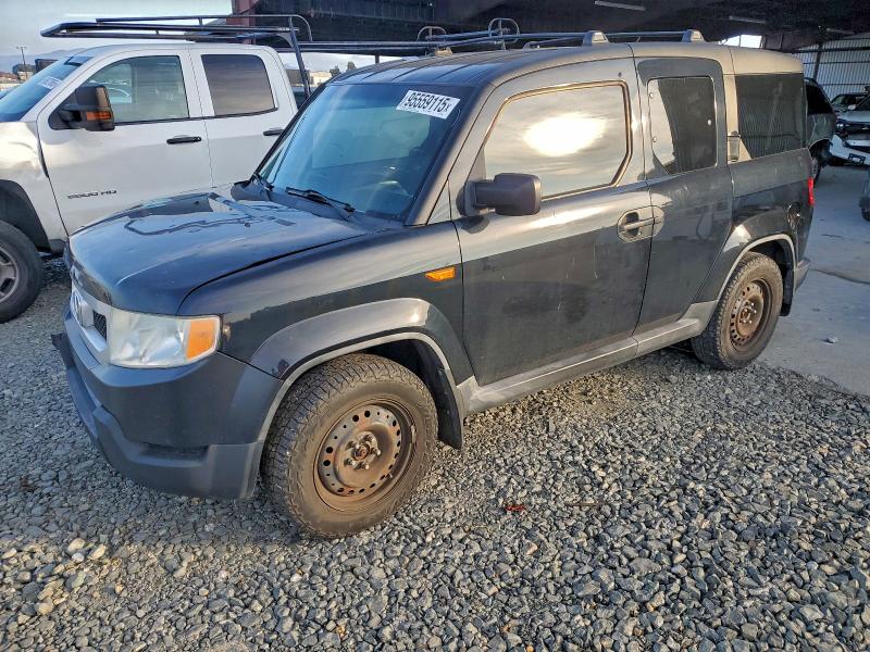 HONDA ELEMENT LX 2011 with VIN 5J6YH2H36BL004720 - Photo from auction