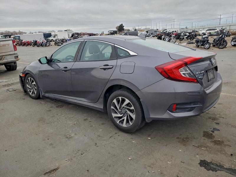 Photo 2 from auction – 2018 HONDA CIVIC EX with VIN 2HGFC2F74JH571247