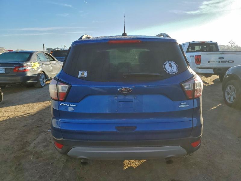 Photo 6 from auction – 2018 FORD ESCAPE with VIN 1FMCU9GD3JUA97487