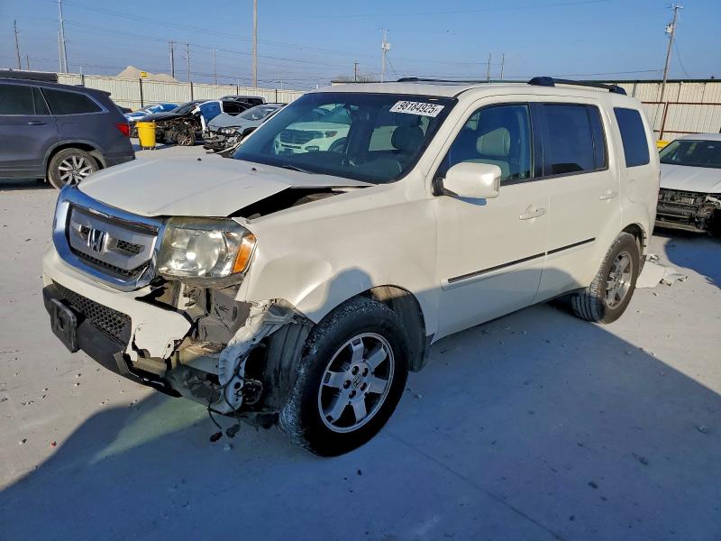 HONDA PILOT TOUR 2011 with VIN 5FNYF3H99BB057436 - Photo from auction