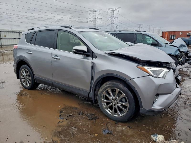 Photo 4 from auction – 2018 TOYOTA RAV4 LIMIT with VIN JTMDFREV8JD237984