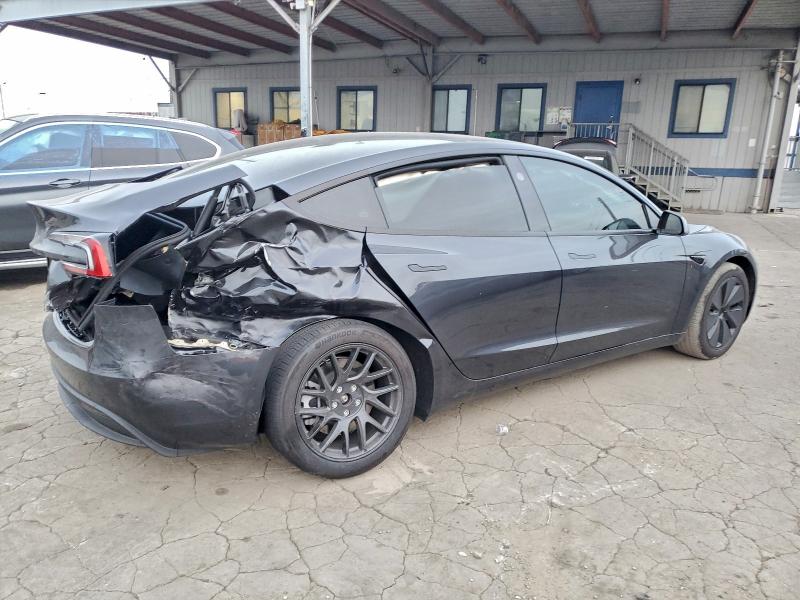 Photo 3 from auction – 2025 TESLA MODEL 3 with VIN 5YJ3E1EA8SF051272