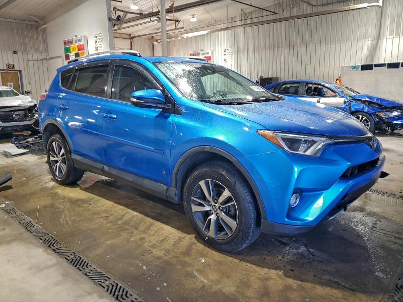 Photo 4 from auction – 2017 TOYOTA RAV4 XLE with VIN 2T3RFREVXHW612714
