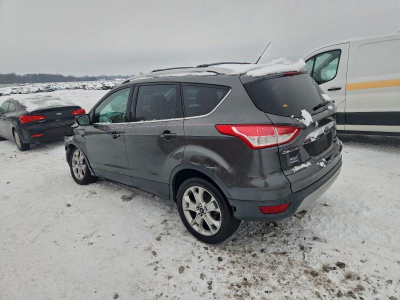 Photo 2 from auction – 2015 FORD ESCAPE with VIN 1FMCU9J9XFUA48153