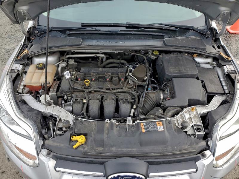 Фото 11 с аукциона – 2014 FORD FOCUS SE с VIN 1FADP3F21EL433460