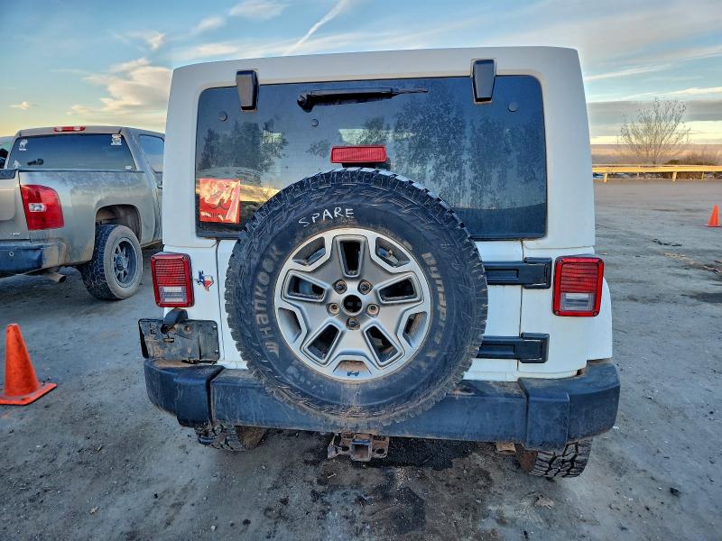 Photo 6 from auction – 2014 JEEP WRANGLER U with VIN 1C4BJWFG9EL325829