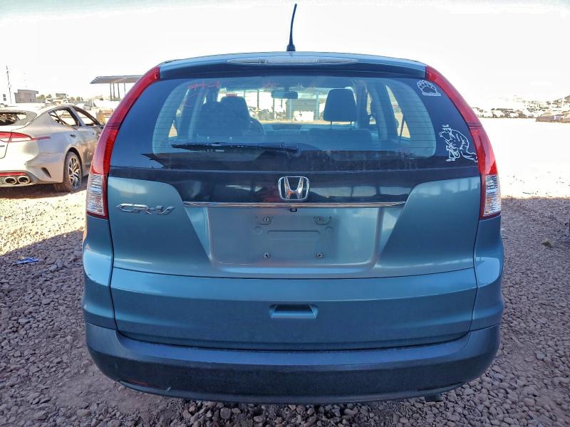 Photo 6 from auction – 2014 HONDA CR-V LX with VIN 2HKRM3H31EH554010
