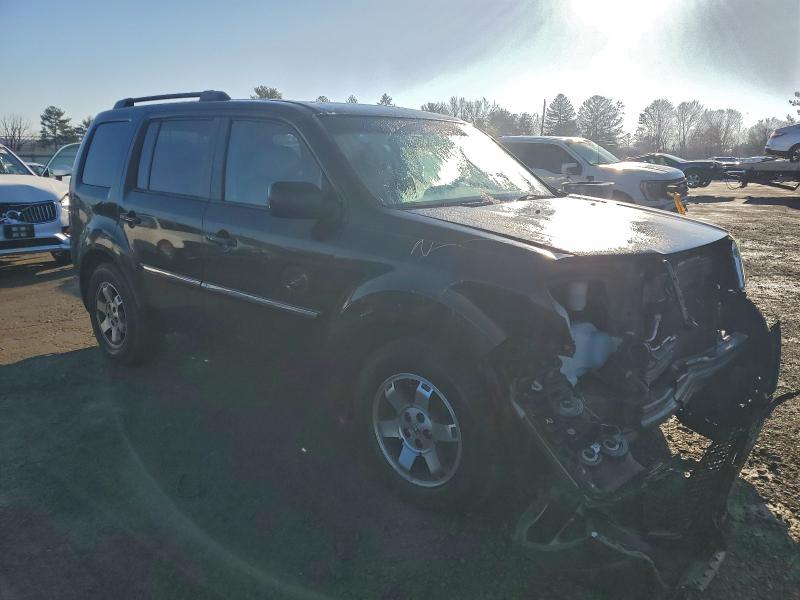Photo 4 from auction – 2011 HONDA PILOT TOUR with VIN 5FNYF4H98BB099523