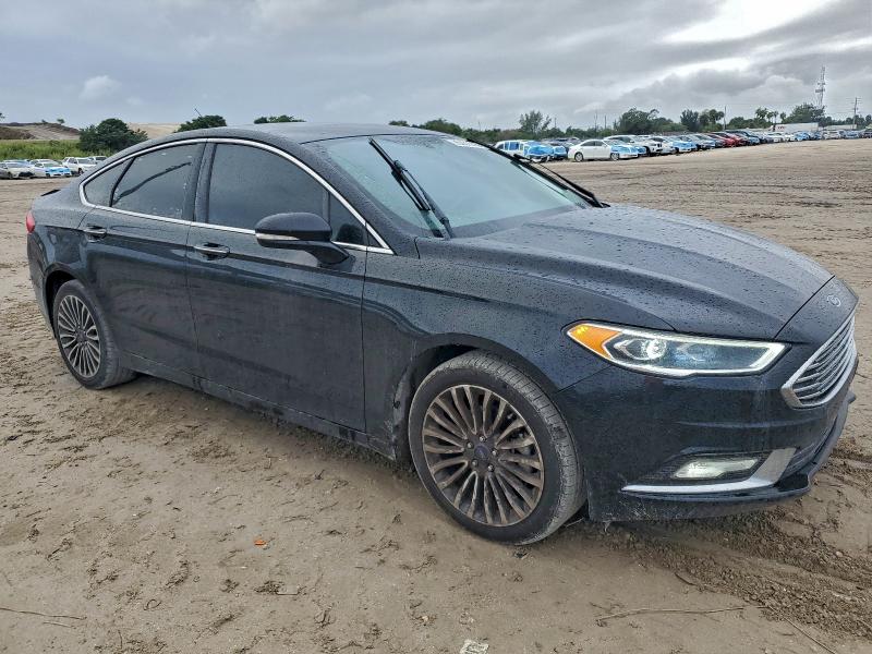 Photo 4 from auction – 2018 FORD FUSION TIT with VIN 3FA6P0D98JR194007